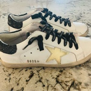 Womens size 7. Great condition. Only worn a couple times! Make me an offer :)